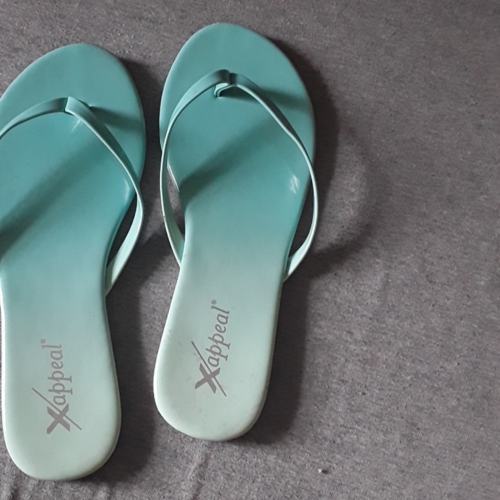 Teal blue flip-flops